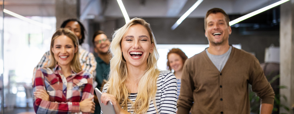 Happy Gen Z employees in office